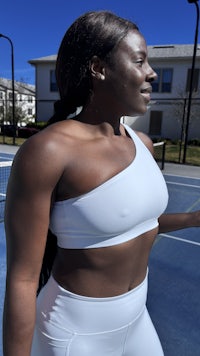 women in white workout top